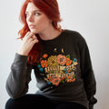 People for the Planet Unisex Pigment Dyed sweatshirt. Garment dyed washed black crewneck pullover. Celebrates Mother Earth.